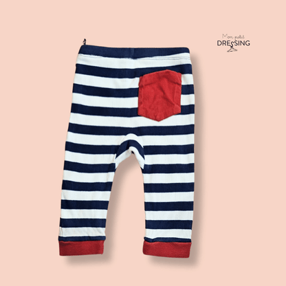 Mon Petit Dressing | Legging rayé bleu blanc et rouge. Poche rouge plaquée côté droit. DPAM