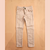 Jeans rose IKKS, détail étoile sur la poche gauche